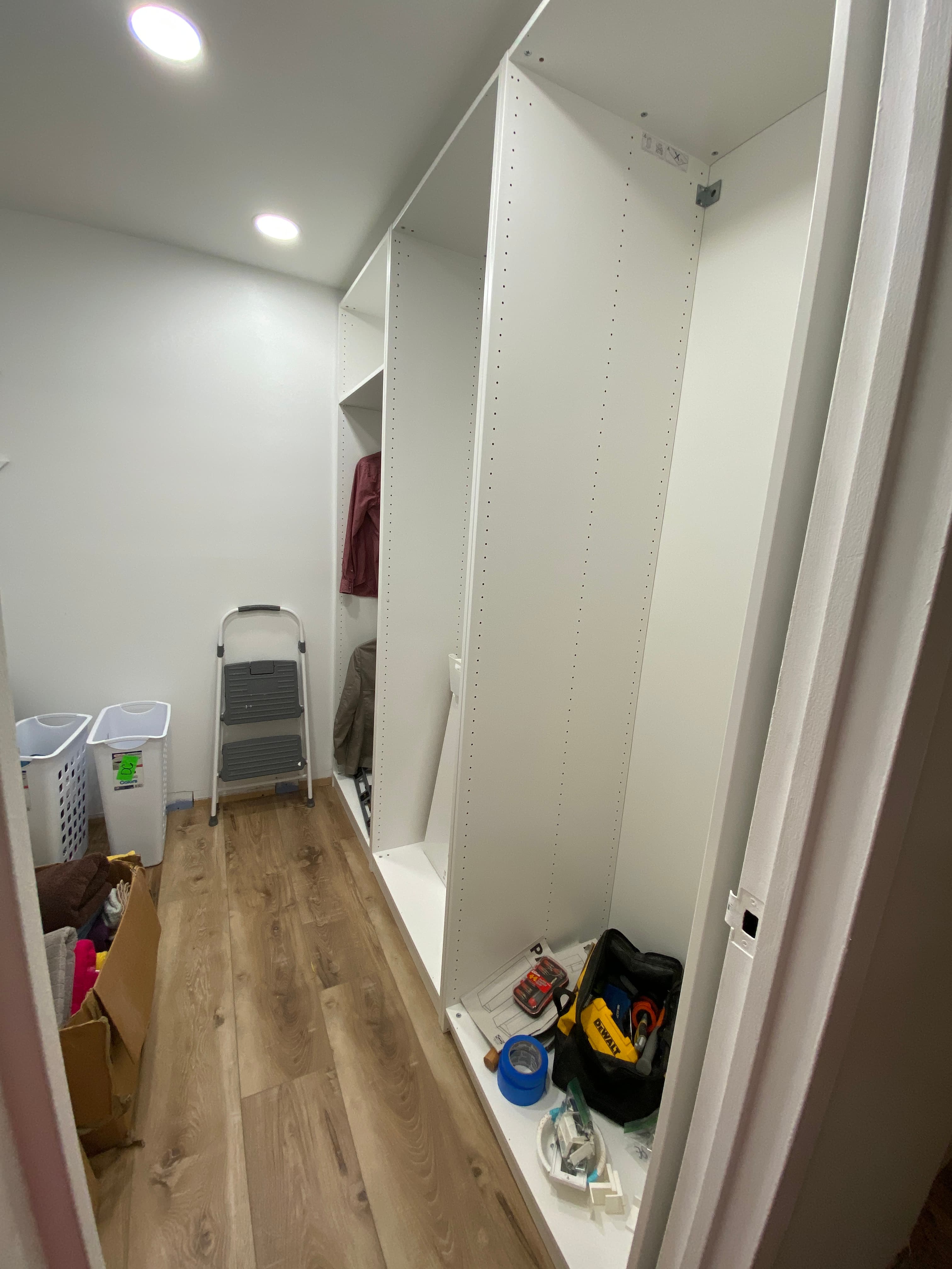 primary closet installation in progress, view 1